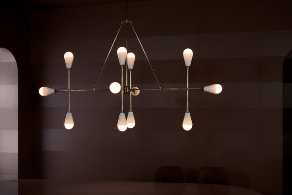 Apparatus Triad 12 pendant with porcelain shades in a beautiful room setting