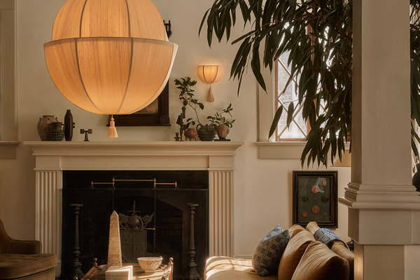 large illuminated raw silk pendant in a beautiful home